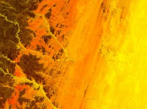 Plateau de l’Ennedi — L’érosion du plateau dessine des formes abstraites dans une palette de couleurs chaudes.